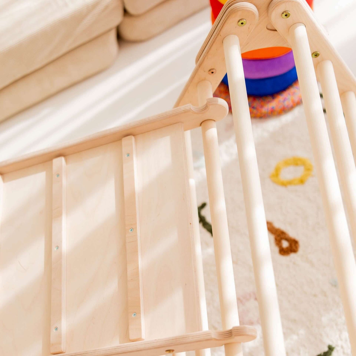 Top view of Kletterset Panda's wooden climbing triangle with smooth design, perfect for children's play and development.