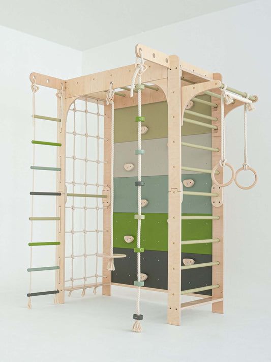 Kletterwand Klimby "Kletterkönig" mit Klettergerüst und verschiedenen Spielstationen für Kinder im Indoor Spielplatz.